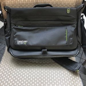 Black Tumi Tech ballistic nylon messenger bag